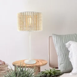 25" Eliza Metal And Tan Wood Beaded Drum Shade Table Lamp White - River Of Goods -Home Decor Store GUEST 80a1a55e f0ce 449a b6cd 94ac9dddd148